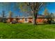 Beautiful backyard with brick exterior and patio set at 5124 Mccray St, Indianapolis, IN 46224