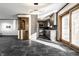 Modern kitchen showcasing gray cabinets, stainless steel appliances, and stylish backsplash at 5124 Mccray St, Indianapolis, IN 46224