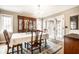 Formal dining room boasting a chandelier, hardwood floors, and a large china cabinet at 5157 N New Jersey St, Indianapolis, IN 46205