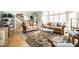 Inviting living room with large windows, hardwood floors, and comfortable seating at 5157 N New Jersey St, Indianapolis, IN 46205