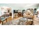 Spacious living room featuring an open floor plan and view to the dining room at 5157 N New Jersey St, Indianapolis, IN 46205