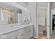 Bathroom with double sinks, large mirror, and ample storage space at 5178 Aegis Dr, Noblesville, IN 46062