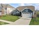 Charming single-Gathering home with a well-manicured lawn, attached two-car garage, and inviting curb appeal at 5178 Aegis Dr, Noblesville, IN 46062