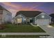 Charming single-Gathering home with a well-manicured lawn, attached two-car garage, and inviting curb appeal at 5178 Aegis Dr, Noblesville, IN 46062