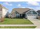 Charming single-Gathering home with a well-manicured lawn, attached two-car garage, and inviting curb appeal at 5178 Aegis Dr, Noblesville, IN 46062
