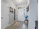 Bright foyer with hardwood floors, a stylish console table, and easy access to other living spaces at 5178 Aegis Dr, Noblesville, IN 46062