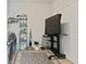 Well-organized laundry room with shelving, appliances, and stylish rug for a functional and aesthetically pleasing space at 5178 Aegis Dr, Noblesville, IN 46062