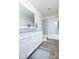 Neutral bathroom featuring a shower and tub combo, white cabinets, granite countertops, and tile flooring at 5300 Veranda Dr, Noblesville, IN 46062