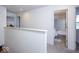 Upstairs hallway leading to bedrooms and a bathroom at 5300 Veranda Dr, Noblesville, IN 46062