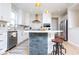 Modern kitchen featuring white cabinets, stainless steel appliances, and a kitchen island with seating at 5300 Veranda Dr, Noblesville, IN 46062