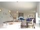 Modern living room that features a fireplace, open to the dining room for Gathering and guest gatherings at 5300 Veranda Dr, Noblesville, IN 46062