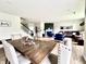 Spacious living room and dining area with modern furniture and decor, creating a warm and inviting atmosphere at 5300 Veranda Dr, Noblesville, IN 46062