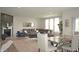 This elegant space features a brick fireplace, with modern couches and chairs. Lots of space for Gathering at 5300 Veranda Dr, Noblesville, IN 46062