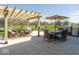 Spacious patio with a pergola, outdoor dining set, and grill at 5300 Veranda Dr, Noblesville, IN 46062