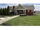 Resident clubhouse featuring a pool and recreation area for community gatherings at 5493 W Woodhaven Dr, McCordsville, IN 46055