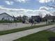 Community playground with swings, slides, and climbing equipment for enjoyment at 5493 W Woodhaven Dr, McCordsville, IN 46055