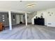 Finished basement featuring carpeted flooring, geometric wall accents, and ample open space at 5739 E 62Nd Pl, Indianapolis, IN 46220