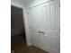 Closet with white double doors, offering ample storage space in a well-lit interior at 5739 E 62Nd Pl, Indianapolis, IN 46220