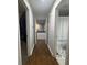 Hallway with view into bath and kitchen offering great flow and access throughout the home at 5739 E 62Nd Pl, Indianapolis, IN 46220