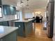 Spacious kitchen showcases an island, stainless steel appliances, and adjacent dining area at 5739 E 62Nd Pl, Indianapolis, IN 46220