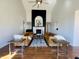 Spacious living room featuring high ceilings, a modern fireplace, and designer furniture at 5739 E 62Nd Pl, Indianapolis, IN 46220