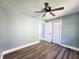 Bright bedroom with neutral walls, new flooring, and closet at 601 Duane St, Franklin, IN 46131