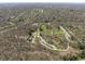 Enjoy this aerial view of the community featuring lush green spaces, walking paths, and convenient parking at 6025 Crows Nest Dr, Indianapolis, IN 46228