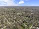 Sprawling residential area featuring lush trees, expansive lawns, and well-spaced homes at 6025 Crows Nest Dr, Indianapolis, IN 46228