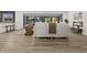 Bright living area showcasing hardwood floors, stylish furniture, and an open layout for easy entertaining at 6025 Crows Nest Dr, Indianapolis, IN 46228