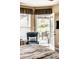 This image showcases access to the outdoor patio from the main bedroom through french doors at 6049 Royal Gate Pl, Indianapolis, IN 46237