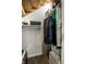 Under stair closet area provides additional storage and shelving at 6049 Royal Gate Pl, Indianapolis, IN 46237
