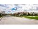 Gated community entrance featuring meticulously landscaped grounds and elegant signage, ensuring privacy and a welcoming atmosphere at 6049 Royal Gate Pl, Indianapolis, IN 46237