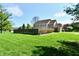 Spacious fenced backyard and two-story home with attached two car garage at 611 Mill Farm Rd, Noblesville, IN 46062