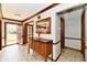 Inviting foyer with decorative wood trim, tile flooring, and a view of the home's interior at 611 Mill Farm Rd, Noblesville, IN 46062