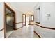 Hallway with natural light, beautiful trim and detailed woodwork, and access to other rooms at 611 Mill Farm Rd, Noblesville, IN 46062