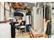 Utility area in basement showing water systems, furnace and general storage of household goods at 611 Mill Farm Rd, Noblesville, IN 46062