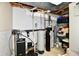 Basement utility room featuring essential systems and ample storage solutions for household needs at 611 Mill Farm Rd, Noblesville, IN 46062
