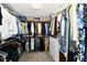 Spacious walk-in closet features custom shelving, hanging rods, and ample storage for clothes and accessories at 611 Mill Farm Rd, Noblesville, IN 46062