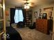Sports-themed bedroom with natural light, a ceiling fan, and ample storage at 6525 Emerald Hill Ct # 208, Indianapolis, IN 46237