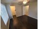 Bright bedroom with hardwood floors, ceiling fan, and multiple closets at 6525 Emerald Hill Ct # 208, Indianapolis, IN 46237