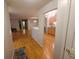 View of a living room that leads into a kitchen with matching cabinets at 6525 Emerald Hill Ct # 208, Indianapolis, IN 46237