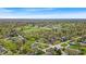 Capture of the lush, green surroundings including the golf course in this vibrant aerial view at 7205 Steven Ln, Indianapolis, IN 46260