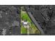 An overhead view shows the property line and layout of this home and yard at 7205 Steven Ln, Indianapolis, IN 46260