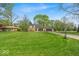 Well-maintained home with an expansive lawn and private driveway, perfect for suburban living and outdoor enjoyment at 7205 Steven Ln, Indianapolis, IN 46260