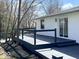 Spacious backyard deck with modern cable railing, offering seamless outdoor living and entertaining at 7440 S 250 W, Pendleton, IN 46064
