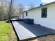 Expansive backyard deck with modern railing, ideal for outdoor relaxation and entertaining at 7440 S 250 W, Pendleton, IN 46064