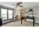 Bedroom featuring natural light, with shelving, and a glimpse into the walk-in closet at 7728 Mallard Way, Indianapolis, IN 46256