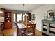 Bright dining area with built-in cabinets and large windows at 7728 Mallard Way, Indianapolis, IN 46256