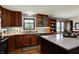 Eat-in kitchen area with granite counters, updated cabinets, and stainless steel appliances at 7728 Mallard Way, Indianapolis, IN 46256