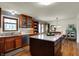Bright eat-in kitchen with center island, stainless steel appliances, and adjacent dining area at 7728 Mallard Way, Indianapolis, IN 46256